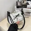 Bolsa Colorida Contrastante com Laço Rosa Crescente Verão 2025 Nova Doce e Fresca Sexy Nicho Ombro Único Transversal Axila