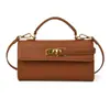 Bolsa de Mão Transfronteiriça para Mulheres 2025 Novo Modelo Pequena Bolsa Quadrada de Comércio Exterior Popular Bolsa Kelly Versátil Bolsa de Ombro Transversal