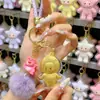 Llavero de Bolsita de Oro 999 Forma de Estrella Souvenir del Evento Promocional Colgante para Eventos de Ventas y Pequeños Regalos de Año Nuevo