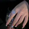 Anel Giratório Super Brilhante de Flor de Quatro Folhas 2026 Novo Estilo Quente Fashionável Versátil Exquisito de Alta Qualidade Flor de Diamante Inteiro Joia