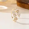 Anillo de Luz de Zirconia Incrustada en Oro Real Chapado en Cobre Transfronterizo Europeo y Americano Lujo Ligero Sensación de Alta Gama Anillo para el Dedo Joyería de Mano Versátil Fabricante Venta al por Mayor en Stock