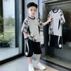 Moda Casual Masculina Roupas de Verão Manga Curta Secagem Rápida Conjunto 2026 Novo Verão Crianças Médias e Grandes Estilo Verão Uniforme de Bola Esportiva Tendência
