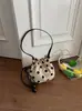 Bolso de Axila para Mujer 2026 Estilo Nuevo Súper Popular Exquisito Moda Lunares Bolso de Hombro Verano Viaje Diario Bolso Cruzado Tipo Cubo