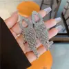 Pendientes largos de borla de lujo con diamantes completos en forma de gota de agua, moda europea y americana exagerada para mujer, versátiles y elegantes para ropa de noche