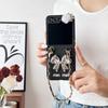 Samsung Zflip 20% de descuento Funda para Teléfono Plegable Pantalla Flip Adecuada para Zflip7 Moño Cadena de Mano con Pedrería Flor de Camelia