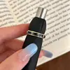 Moda Retro Elegante Anillo Abierto de Alta Gama Elegante Lujo Accesible Diseño Sencillo de Nicho Joyería de Mano Personalizada para Mujeres