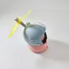 Adorno de Hucha de Coche Eléctrico Famoso en Internet Llevando un Casco, Linda Decoración de Coche, Suministro Exclusivo Transfronterizo para Motocicleta y Bicicleta