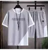 Camiseta Casual de Manga Corta Elegante para Hombre Marca de Moda Tendencia Pantalones Cortos Deportivos Holgados Conjunto de Dos Piezas Nueva Tendencia de Moda