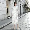 Venta caliente transfronteriza Miyake alta gama sentido volantes vestido midi mujer otoño temperamento estilo suave elegante falda de manga larga