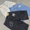 Pantalones cortos de estilo retro de la calle principal con bordado de estrellas y estilo Corteiz Alcatraz.