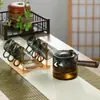 Xícaras de Chá de Vidro Cinza Fumê Espessado Resistente ao Calor, Xícaras de Chá Pequenas, Conjunto de Seis, Conjunto de Chá Kung Fu para Convidados, Uso Doméstico com Alça