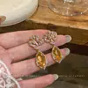 Resplandor de Osmanthus Dorado~Aretes Flor de Zirconia Aguja de Plata Estilo Corte Francés Aretes de Artesanía Pesada Lujo Ligero Aretes de Alta Gama para Mujer