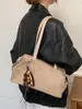 Bolso de mano retro de nicho transfronterizo para ir al trabajo, nuevo modelo de moda 2026 para mujer, bolso de hombro debajo del brazo de gamuza de gran capacidad
