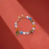 Nuevo Pulsera de Imitación de Cera de Abeja Xizang Étnica Estilo Chino con Sensación Vintage de Nicho de Alta Gama, Cuerda de Cera, Anillos Redondos, Cascabeles y Pulsera de Cuentas