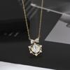 Oro Real electrochapado micro incrustado circonio elegante cadena clavícula diseño de nicho femenino collar de lazo exquisito collar de pétalos