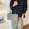 Bolso de mano de moda casual de un solo hombro gran capacidad 2026 versátil para el trabajo de otoño gamuza nuevo bolso simple para mujer estilo coreano