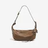 Design de Nicho High-End Bolsa Transversal Estilo Dumpling para o Dia a Dia de Mulheres Inverno 2025 Nova Bolsa de Ombro Portátil para Mulheres Venda por Atacado