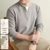 Tejidos para Hombre con Seda de Morera y Lana 2026 Otoño Nueva Llegada Falso Dos Piezas Cuello Redondo Manga Larga Capa Base Sudadera Hombre