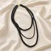 Collar de cuentas de vidrio multicapa para mujer, cadena de clavícula de nicho de lujo ligero, suéter, cadena de nicho, joyería nueva de lujo ligera