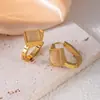 Pendientes Europeos y Americanos Geométricos Redondos Incrustados Imitación Turquesa Ojo de Gato Acero de Titanio Acero Inoxidable de Alta Gama Elegantes Modernos