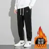 Calça de Moletom Forrada com Fleece Masculina Adolescente 2025 Nova Outono/Inverno Modelagem Solta Patchwork Com Punho Casual Calça de Veludo