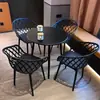 Juego pequeño de mesa y sillas redondas de acero al carbono simple para ocio en balcón, mesa de discusión, área de descanso, mesa de comedor para cafetería de té con leche al aire libre