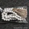 Amazon Estilo Pastoral Color Madera Natural Cadena de Cuentas Redondas de Madera con Borla de Yute 142cm Adorno de Decoración para el Hogar Cuentas Sueltas Cuentas Redondas