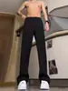 Pantalones de vestir negros de pierna recta con caída de alta gama, elegantes y ligeramente acampanados, Pantalones casuales de traje slim-fit para hombre de primavera