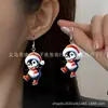 Pendientes Navideños Lindos de Venta Caliente Transfronterizos Estilo Dibujos Animados con Gorros Rojos Navideños, Bufandas y Adornos Navideños de Pingüino para Orejas