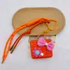 Cartera de Cuero Original para Monedas Bolsa para Auriculares Bluetooth Colgante Serie Miu Llavero Bolsa Pequeña de Regalo de Gama Alta