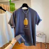 Camiseta Creativa Estampada de Manga Corta para Mujer 2026 Verano Nuevo Diseño de Nicho Hombro Derecho Talla Grande Suelto Top para Mujer