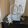 Bolso Versátil Transfronterizo Bolso de Moda 2026 Nuevo Pequeño de Nicho Retro para el Trabajo Bolso de Hombro Único Bolso Baguette Bolso Cruzado