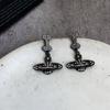 Hip hop oscuro dulce fresco Super Brillante pedrería estrella de cinco puntas hueso planeta letra aretes collar personalidad joyería europea y americana