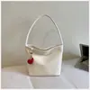 Bolso Tejido de Gran Capacidad para el Trabajo Diario 2026 Verano Nuevo Bolso de Hombro de Alto Valor Bolso Cubo de Estilo Relajado y Moderno