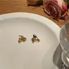 Nuevos aretes de lazo negros para mujer aguja de plata S925 diseño nicho aleación clip para la oreja aretes de tendencia de moda al por mayor