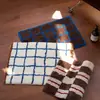 Venta al por mayor de alfombras de moda, de bloques de color, a cuadros y flocadas para exportación, con tufting de alta densidad, tapetes de baño absorbentes y tapetes de entrada antideslizantes