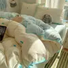 2026 Nuevo Algodón Nube Estilo Coreano Bordado Punto Concha Juego de Cuatro Piezas Funda Nórdica Sábana Bajera Ropa de Cama Venta al por Mayor