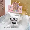 Pequeños regalos de fiesta empaquetados individualmente, lindos colgantes de peluche, muñecos de dibujos animados, muñecos para lanzar en bodas, recuerdos de fiesta y decoraciones colgantes