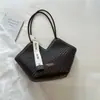 Bolso elegante de gran capacidad modelo nuevo 2026 bandolera de hombro moderna para mujer bolso de mano para el trabajo bolso tote de moda