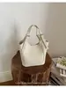 Bolso Cubo de Moda Nicho Estilo Coreano Transfronterizo, Nuevo Bolso de Mano Versátil Simple Retro de Hombro Cruzado de Alta Gama