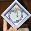 Libro Caperucita Roja Mismo Estilo Estudiante Pulsera de Glaseado de Palomitas de Maíz Hecha a Mano con Cuentas Dibujos Animados Cristal Pulsera Infantil Venta al por Mayor Cajas de Regalo