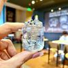 Nueva taza flash iceberg botella de arena movediza con aceite decoración llavero colgante pequeña joyería caja ciega regalo de bienestar venta al por mayor