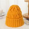 Nuevo gorro giratorio de otoño e invierno para hombres y mujeres, gorro de punto para estudiantes, cálido gorro de lana de color sólido con protección para los oídos a la moda, venta al por mayor