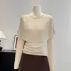 Nueva moda para mujer 2026: un look de dos piezas, top de punto con mangas largas, cuello redondo, diseño de jersey y sobrecapa estilo chal, perfecto para principios de otoño