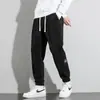 Pantalones deportivos transfronterizos finos, de corte holgado y hasta el tobillo para hombre, adecuados para primavera, otoño e invierno; pantalones largos casuales de pana para hombre
