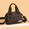 Bolso de mujer moderno y elegante, modelo nuevo 2026, bolso de hombro simple y ligero, bolso cruzado versátil casual de nailon, bolso para mamá