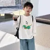 Camiseta de manga larga de algodón puro para niños, versátil top de dibujos animados nuevo para primavera y otoño 2026, camiseta básica para niños, ropa para niños talla mediana y grande