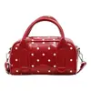 Bolsa de almohada roja de mano para Año Nuevo para mujer, estilo coreano, nuevo diseño de lunares de nicho, bolso de hombro cruzado elegante y versátil