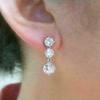 Aretes largos redondos de circonita Cao Shi Aretes de moda europea y americana para mujer Aretes súper brillantes que combinan con todo Venta al por mayor de fábrica