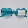 Fabricante Original Gafas de Sol Color Melocotón Brillante Forma de Corazón Montura de Gelatina Color Corazón Gafas de Sol de Una Pieza Sin Montura con Forma de Corazón